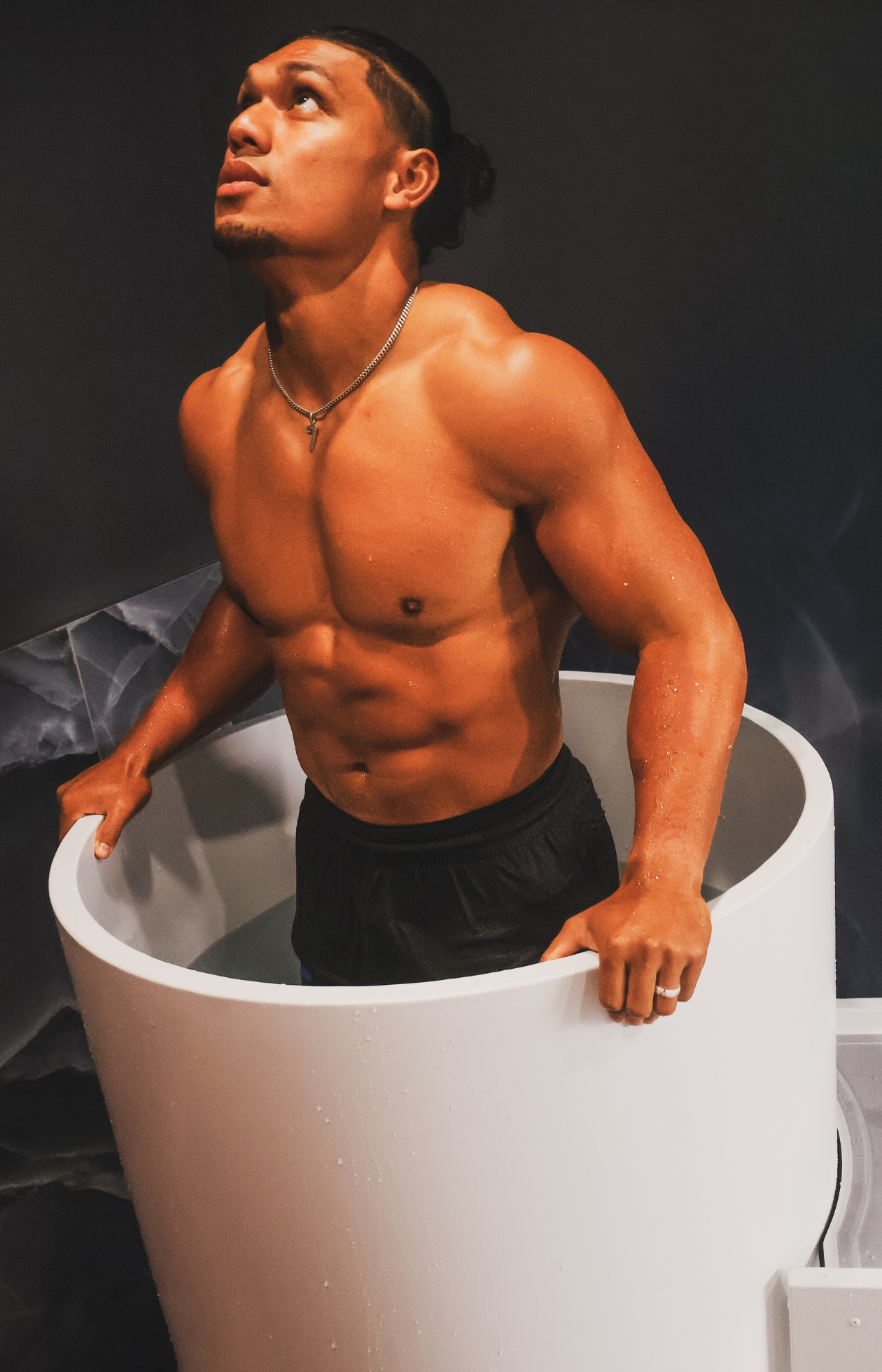 Gym member using a cold plunge at Alpine Fitness Recovery Spa, highlighting cold plunge therapy for muscle recovery, inflammation reduction, post-workout recovery, and athletic performance; recovery spa services including red light therapy, sauna, steam room, massage therapy, and advanced wellness recovery treatments. Reach out to us today for help with recovery spa near me, recovery spa services near me, gym recovery spa, athletic recovery center, wellness recovery spa, post-workout recovery near me, muscle recovery therapy near me, sports recovery treatments, red light therapy near me, red light therapy for recovery, infrared red light therapy benefits, red light therapy for pain relief and inflammation, sauna near me, sauna therapy for recovery, infrared sauna near me, sauna detox therapy, sauna after workout recovery, steam room near me, steam room therapy benefits, steam room for muscle recovery and relaxation, steam room detox and circulation, cold plunge near me, cold plunge therapy benefits, ice bath recovery near me, contrast therapy sauna and cold plunge, hydrotherapy recovery near me, massage therapy near me, therapeutic massage near me, deep tissue massage recovery, sports massage therapy, recovery massage near me, recovery spa Alpine UT, recovery spa Lehi UT, recovery spa American Fork UT, recovery spa Highland UT, holistic recovery services, fitness recovery services near me, injury prevention recovery therapy, stress relief recovery spa, performance recovery services near me, gym with sauna steam room and cold plunge near me.