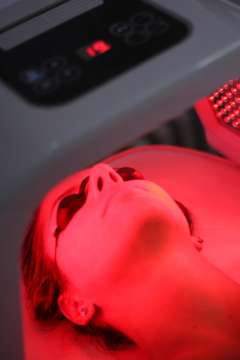 Woman receiving red light therapy at Alpine Fitness for muscle recovery, pain relief, inflammation reduction, and post-workout healing using non-invasive LED light therapy and photobiomodulation treatment. Reach out to us today for help with Red Light Therapy in Alpine UT, red light therapy near me, red light therapy for muscle recovery Alpine UT, red light therapy for pain relief near me, red light therapy for inflammation Alpine UT, red light therapy for joint pain near me, red light therapy for post-workout recovery, red light therapy for athletes Alpine UT, LED light therapy near me, infrared red light therapy, photobiomodulation therapy Alpine UT, red light therapy sessions near me, red light therapy for circulation, red light therapy for injury recovery Alpine UT, red light therapy for wellness near me, non-invasive red light therapy, gym red light therapy Alpine UT, recovery center red light therapy, muscle recovery therapy near me, red light therapy for skin health Alpine UT, red light therapy for collagen production near me, red light therapy spa Alpine UT, red light therapy treatment near me, advanced recovery therapy Alpine UT, performance recovery red light therapy.
